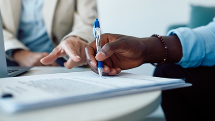 people filling out paperwork